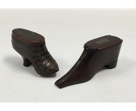 Two treen shoe snuff boxes to include: a 19th century example depicting a lady’s shoe, with sliding top cover, and inlaid pin