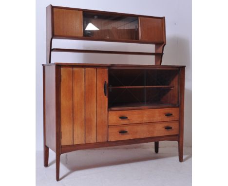 A vintage 1950's Danish style teak wood&nbsp; Lebus&nbsp; link series sideboard credenza. The sideboard being raised on angle