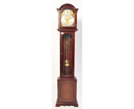 A 20th century mahogany cased Tempus Fugit Longcase clock. Mahogany case with glass fronted hood with inset brass and silvere