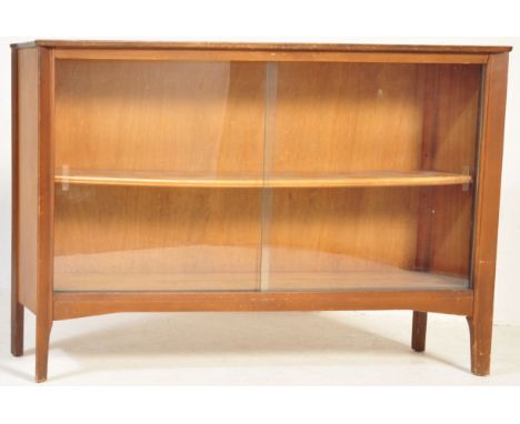 Lebus Furniture - A mid century teak wood Lebus furniture ' link ' model bookcase cabinet. Raised on shaped legs supporting a