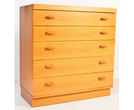 A retro 20th century Turnidge of London teak wood pedestal chest of drawers. Raised on an inset plinth having an upright bank