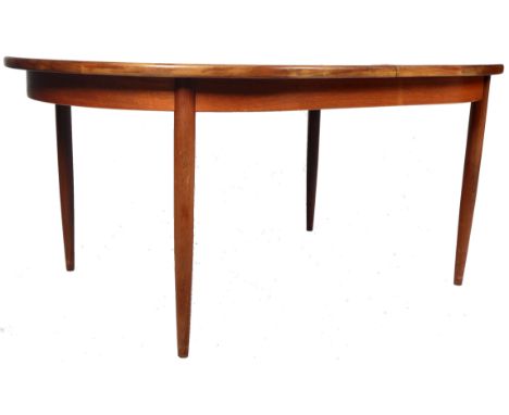 Victor B Wilkins - G Plan - Fresco - An original retro vintage 1960's teak wood dining table comprising of an extending oval 