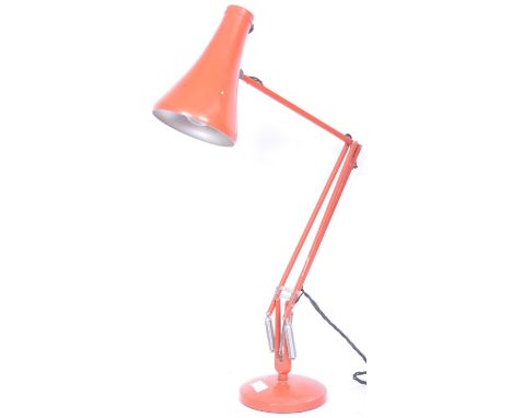 A vintage retro industrial mid 20th century Anglepoise Herbert Terry lamp with sprung mechanism over a weighted base and coni