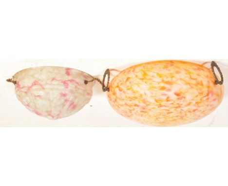 Two vintage 20th century Art Deco style glass light shades having mottled decoration in orange &amp; peach.&nbsp;Measures app
