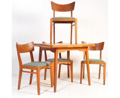 E. Gomme - G Plan - Brandon Range - A retro vintage mid 20th Century golden oak draw leaf table and matching four chairs. The