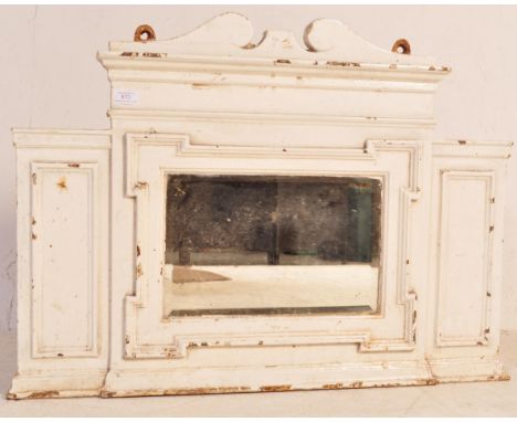 A Victorian 19th century cast iron Neo-classical Coalbrookdale manner over mantel mirror. The cast iron constructed mirror be