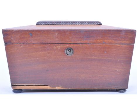 A 19th century Victorian mahogany sarcophagus shaped tea caddy. Rectangular form with hinged top opening to reveal sectioned 