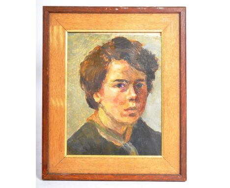 A mid 20th Century oil on board portrait painting of a young boy wear a green shirt and neckerchief. Signed to the back of th