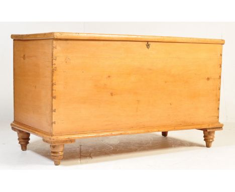 A Victorian 19th century pine blanket box / chest. The trunk having concealed candlestick compartments within and being raise