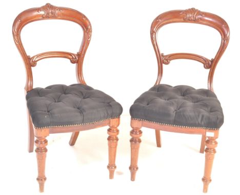A pair of 19th century Victorian mahogany dining chairs having acanthus leaf carving to the backrest, chesterfield button sty