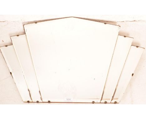 A 1930'S Art Deco frameless fan shaped over mantel mirror. Bevelled frameless edge with stunning Odeon fan shaped behind havi