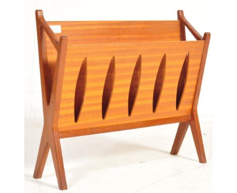 A mid century retro 1960's Danish inspired&nbsp; teak wood v-shaped magazine rack. Each panel side with pierced oval centres.