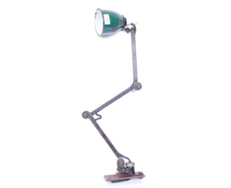 A vintage retro mid 20th century industrial anglepoise style work lamp light with a green enamel conical shade with adjustabl