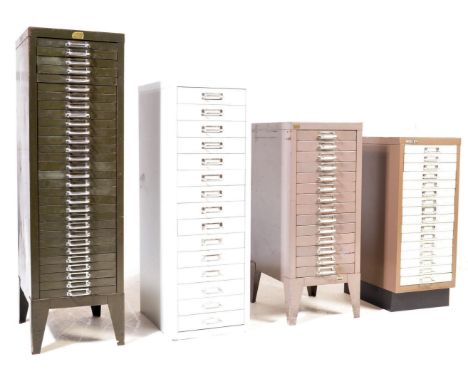 A collection of four retro vintage mid 20th century industrial metal filing cabinets having a Philpott 30 drawer cabinet of u