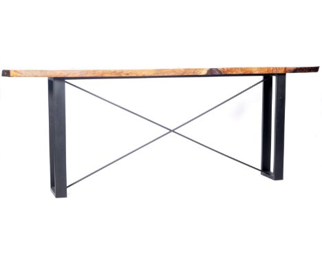 A late 20th Century retro modernist live / living edge console table / breakfast bar comprising of a long natural wood top ra