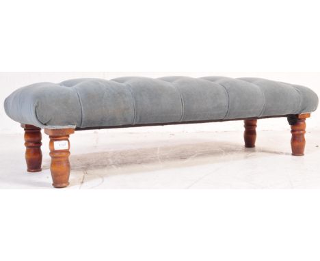 A Victorian 19th century mahogany long 3FT footstool. Raised on turned mahogany legs supporting a long overstuffed blue velou