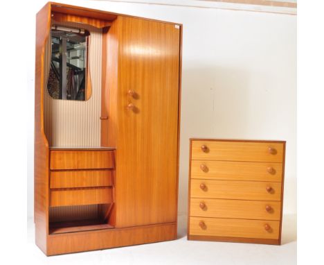 A retro vintage mid 20th century circa 1970s teak bedroom suite comprising of a single door wardrobe opening to reveal hangin