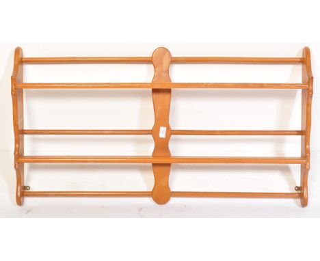 
Ercol - Golden Dawn - Model 268 - A retro vintage mid 20th Century 1960's&nbsp; beech and elm wood hanging plate rack / book