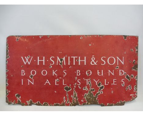 A W.H.Smith &amp; Son 'Books bound in all styles hanging enamel sign, 51 x 27". 