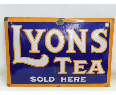 A Lyons' Tea Sold Here convex enamel sign, in good condition, 29 1/2 x 19 1/2".