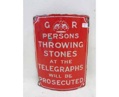 A small curved enamel sign - GR Persons throwing stones at the telegraphs will be prosecuted, 6 x 7 3/4". 