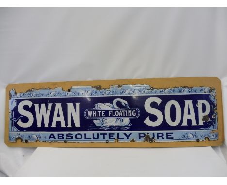 A Swan Soap 'Absolutely Pure' enamel sign, mounted on a wooden board, 60 1/2 x 16" (sign only).