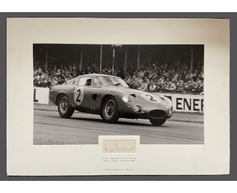 Motor Racing Innes Ireland 25x18 inch overall mounted signature piece includes signed album page and vintage Aston Martin 196