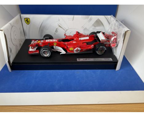 Hot Wheels Racing 2006 Ferrari 248 F1 Michael Schumacher 1:18 scale model. Scuff marks on model in original box. Good conditi