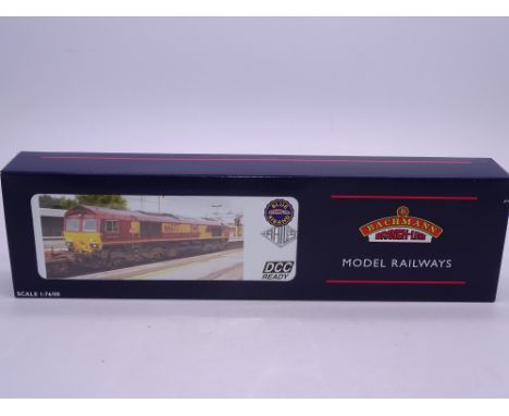 OO Gauge: A BACHMANN 32-725Z Class 66 diesel loco - 'Benjamin Gimbert GC' - EWS Maroon Livery - limited edition for Rails of 