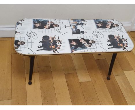 THE BEATLES - 60S COFFEE TABLE WITH 'THE BEATLES' PRINT TOP as lotted