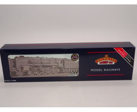 OO Gauge: A BACHMANN 32-850Z Class 9F steam locomotive - Numbered 92240 - BR Black (weathered) Livery - limited edition for M