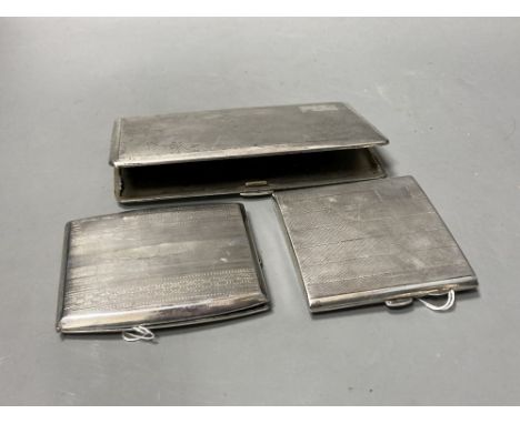 Three engine-turned silver cigarette cases, various, two with English hallmarks, one inscribed to interior, one stamped 'Silv