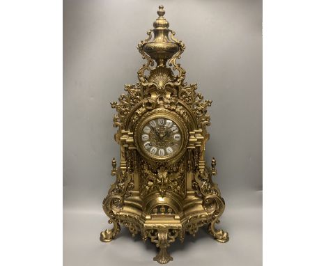 A large 20th century German brass mantel clock, 61cm