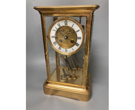 A French brass four glass mantel clock, retailed by J W Benson, with visible Brocot escapement and mercury filled pendulum bo