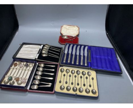 Six assorted cased sets of English silver and Continental flatware, including a cased set of six 1930's planished silver hand