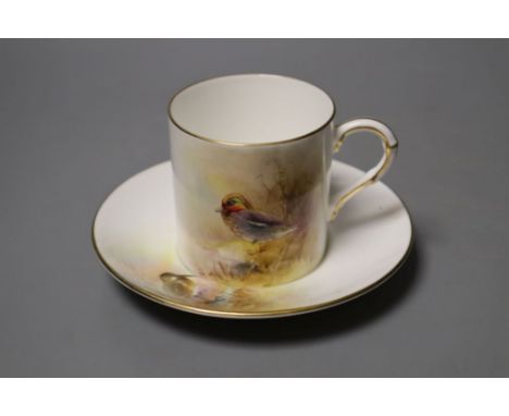 A Royal Worcester coffee can and saucer painted with game birds by P. Platts, signed, date code 1955, 12cm