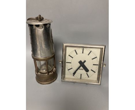 A 1930's Gent's of Leicester mantel clock and a Miner's lamp by Eccles, 24cm