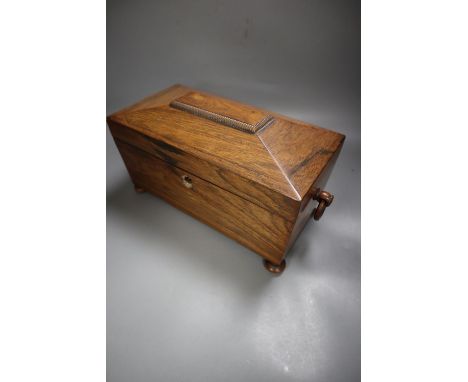 An early Victorian rosewood sarcophagus shaped two division tea caddy, width 30cm