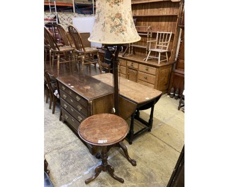 A Victorian mahogany tripod wine table, diameter 50cm height 70cm, together with a carved standard lamp