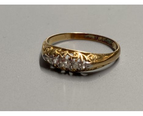 An early 20th century 18ct gold and graduated five stone diamond ring, size O, gross 2.1 grams.CONDITION: Some minor wear to 