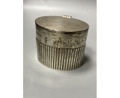An Edwardian demi fluted silver oval tea caddy, William Hutton &amp; Sons, London, 1909, 82mm, 6.5oz.CONDITION: A few minor n