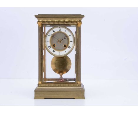 A Victorian brass and glazed mantle clock, 28.5cm high, with eight day movement
