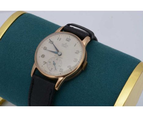 A 1950s Smiths De Luxe manual wind 9ct gold cased wristwatch, 31mm, plain snap off back, typical wear and appears to run, gro