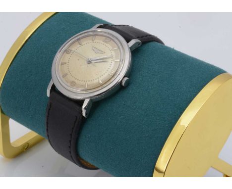 A vintage Longines manual wind stainless steel wristwatch, 33.8mm, appears to run, with Certina rear cover