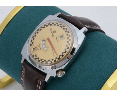 A c1960s Newmark manual wind Jump style stainless steel wristwatch, 35.5mm, gilt dial with chequer pattern and having sweepin