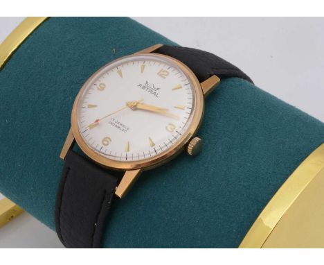 A 1970s Astral manual wind 9ct gold cased wristwatch, 33mm, silvered dial with batons, appears to run, on later strap, engrav