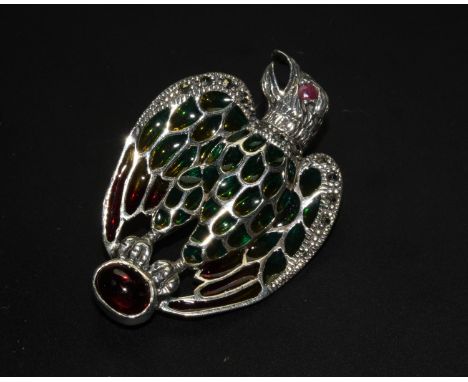 A Silver Eagle brooch/pendant set with a cabochon garnet, ruby eye, marcasite and plique-a-jour 