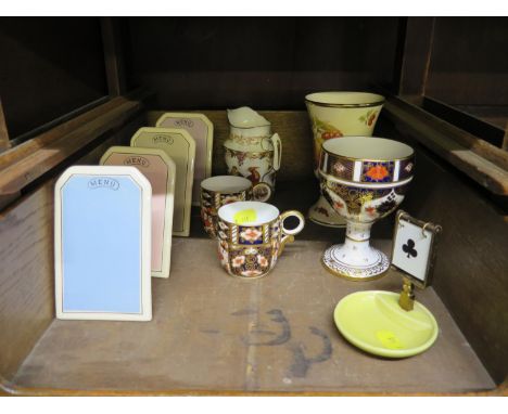 A Royal Crown Derby Imari pattern goblet and two cups, an 'Olde Avesbury' milk jug, a Palissy goblet, a Wade Bridge trump mar