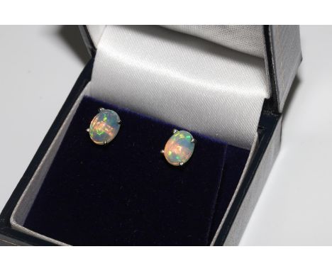 Pair Ethiopian opal studs, in silver 