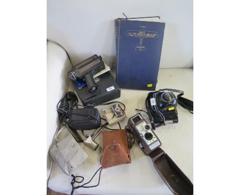 A Cherry Excellent miniature camera, with tripod and shutter release, Bell &amp; Howell 624 cine camera, other camera equipme